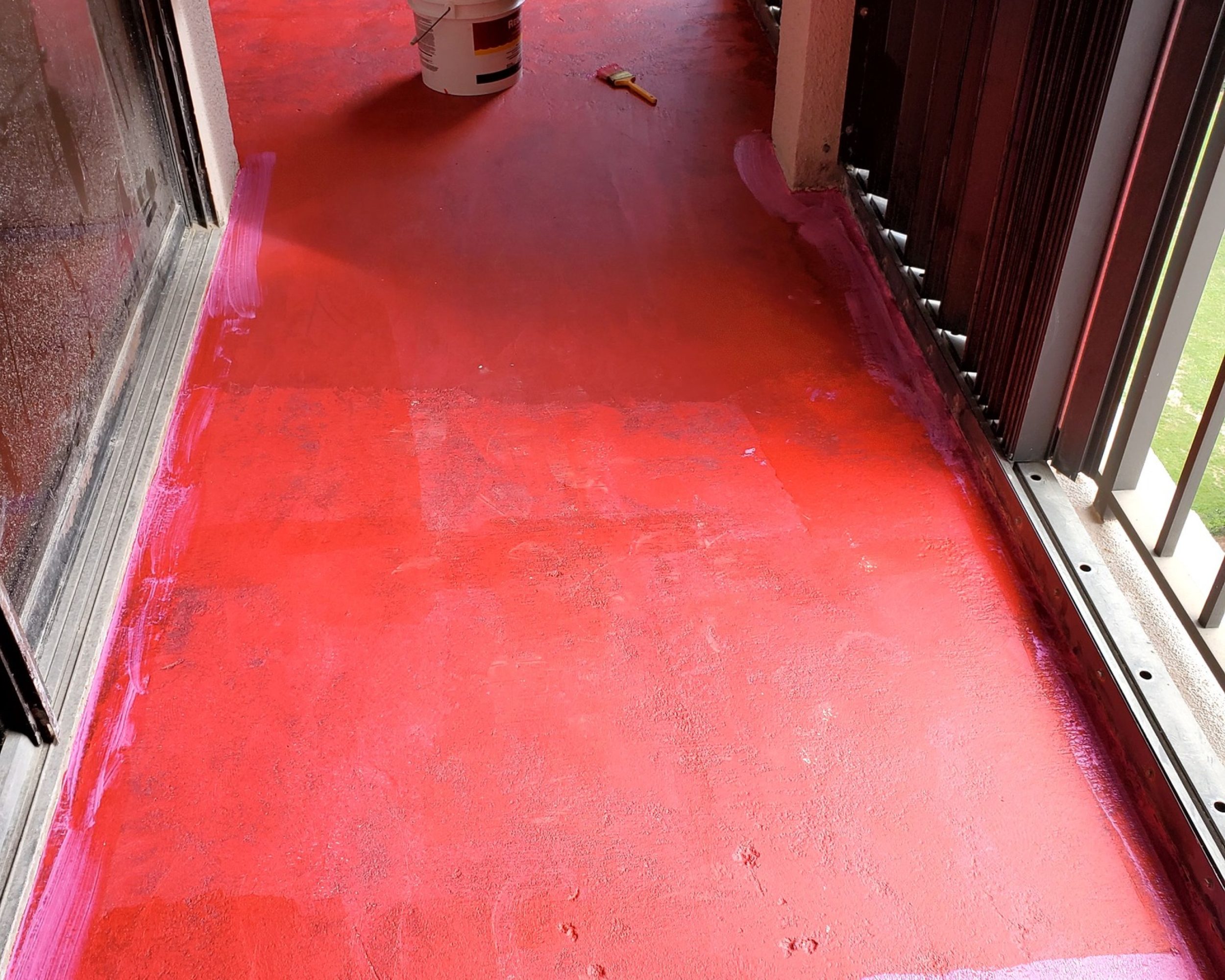 Applying waterproofing on balcony before tile