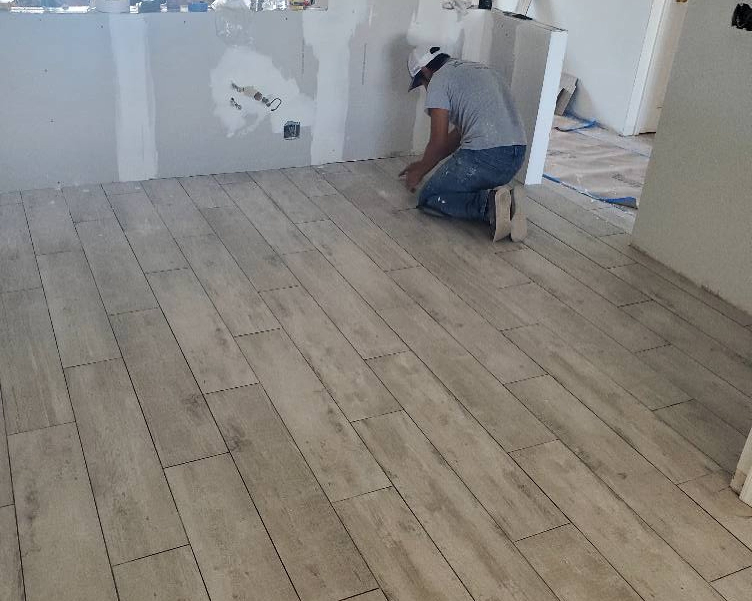 grout all tile floor and clean up.